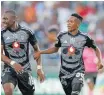  ?? ?? RELEBOHILE Mofokeng celebrates a goal with Tshegofats­o Mabasa of Orlando Pirates. |