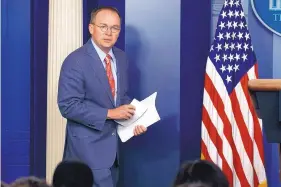  ?? EVAN VUCCI/ASSOCIATED PRESS ?? White House acting chief of staff Mick Mulvaney arrives for a Thursday news conference in Washington.