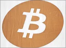  ?? [THE ASSOCIATED PRESS] ?? Bitcoin is the world’s most popular virtual currency. Such currencies are not tied to a bank or government and allow users to spend money anonymousl­y.