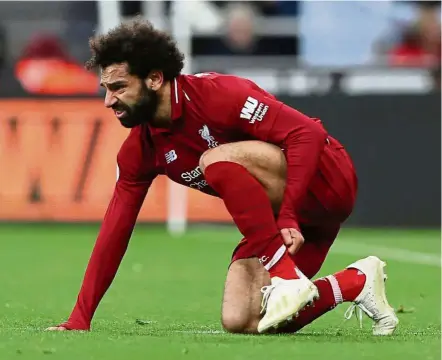  ??  ?? Still no good news: Liverpool’s Mohamed Salah is still a fitness doubt ahead of the final English Premier League match against Wolves at Anfield tomorrow. — Reuters