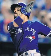  ?? THE CANADIAN PRESS/FILES ?? Toronto’s Devon Travis is proving to be fully recovered from off-season knee surgery at spring training.