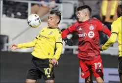  ?? JOE MAIORANA — THE ASSOCIATED PRESS ?? Columbus midfielder Lucas Zelarayán, left in this shot from a game against Toronto, will lead the Crew against the Union Saturday night at Subaru Park.