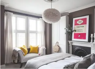  ??  ?? MASTER BEDROOM A bright pink print adds a pop of colour.
Umage Eos lampshade, £120, Nicola Casperson Interiors. Together Penguin art print, £220, King & Mcgaw. Walls in London Clay estate emulsion, £47.95 for 2.5ltr, Farrow & Ball