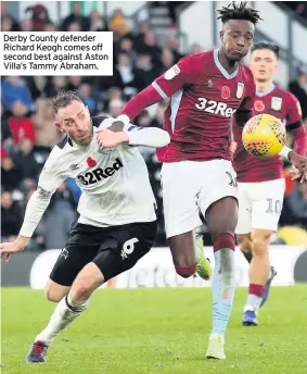  ??  ?? Derby County defender Richard Keogh comes off second best against Aston Villa’s Tammy Abraham.