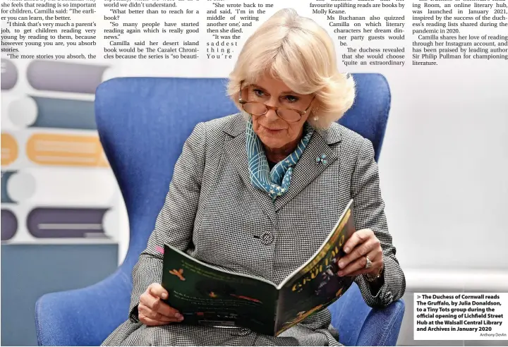  ?? Anthony Devlin ?? > The Duchess of Cornwall reads The Gruffalo, by Julia Donaldson, to a Tiny Tots group during the official opening of Lichfield Street Hub at the Walsall Central Library and Archives in January 2020