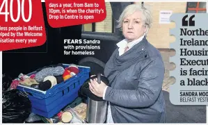  ??  ?? FEARS Sandra with provisions for homeless