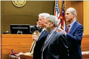 ??  ?? Defense attorney Bruce Harvey gives the jury an eye measure of Claud “Tex” McIver (left) and fellow defense attorney Don Samuel on Friday.