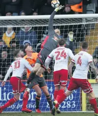  ??  ?? JAAK REACHER Stevenage keeper Anssi Jaakkola tips over