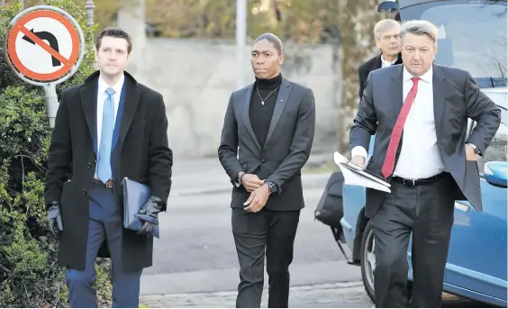  ?? Picture: AFP ?? GAME ON. Olympic 800m champion Caster Semenya, centre, and her lawyer Gregory Nott, right, arrive for a landmark hearing at the Court of Arbitratio­n for Sport in Lausanne yesterday. Semenya is challengin­g a proposed rule by the IAAF aiming to restrict testostero­ne levels in female runners.