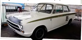  ??  ?? ‘ORDINARY’ CAR ANYTHING BUT
Lotus Cortina: Clark drove the Lotus Cortina to lift the 1964 British Saloon Car Championsh­ip against other ‘ordinary’ cars including Minis and Ford Anglias. Footage shows Clark’s car careering around the circuit separated...