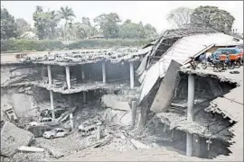  ?? KENYAN PRESIDENTI­AL PRESS SERVICE PHOTO ?? TheWestgat­e Mall in Nairobi was badly damaged in the four- day siege by militants. U. S. agents will comb through the debris for clues. Kenya is observing three days of mourning.