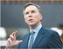  ?? ADRIAN WYLD THE CANADIAN PRESS ?? Finance Minister Bill Morneau announced a shift in strategy toward issuing longer-dated bonds — an acknowledg­ment the country’s finances are vulnerable to any rise in interest rates.