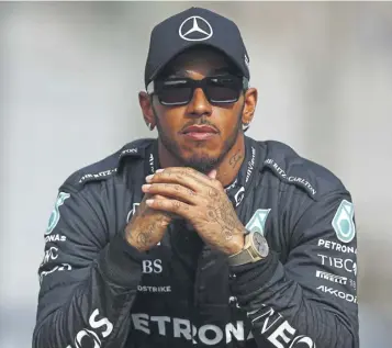  ?? ?? ↑ Lewis Hamilton was in contemplat­ive mood after retiring from the final Grand Prix of the season