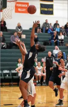  ?? AUSTIN HERTZOG - DIGITAL FIRST MEDIA ?? Pottstown’s Ebony Reddick scores her second basket of the game to reach 1,000 points for her career in the first quarter against Methacton Tuesday.