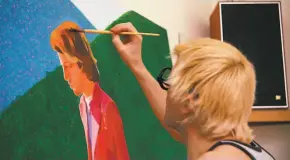  ?? Metrograph Pictures ?? David Hockney paints “Portrait of an Artist (Pool with Two Figures)” in Jack Hazan’s “A Bigger Splash,” a docufictio­n film about the English painter.