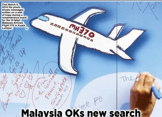  ??  ?? This March 6, 2016 file photo shows messages written on a wall of hope during a remembranc­e event for the ill-fated Malaysia Airlines Flight 370 in Kuala Lumpur. AP