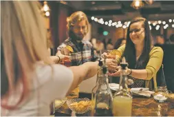  ?? SALEINA MARIE PHOTOGRAPH­Y VIA AP ?? A bartender serves patrons ‘mocktails’ in Seattle. Alcohol-free mixed drinks grew 35 percent as a beverage type on the menus of bars and restaurant­s from 2016 to this year, according to research firm Mintel.