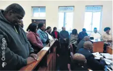  ??  ?? The ‘SASSA 11’ rise in the Empangeni Magistrate’s Court for their bail hearing on Thursday morning