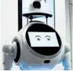  ?? —AFP ?? SCREENER A robot waits for patients.