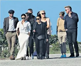  ??  ?? French fancy: the Beckhams with friends, including Eva Longoria and Gordon Ramsay, near Bordeaux