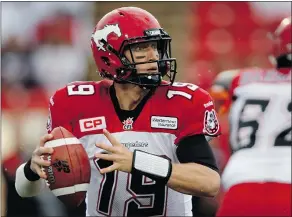  ??  ?? Calgary Stampeders offensive co-ordinator Dave Dickenson says his team’s quarterbac­k Bo Levi Mitchell, above, and Ticats QB Zach Collaros are tough and aren’t afraid to throw downfield.