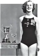  ??  ?? Diving champ: Young Helen