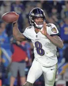  ?? JAKE ROTH/USA TODAY SPORTS ?? Lamar Jackson has led the Ravens to wins in five of the team’s last six games.
