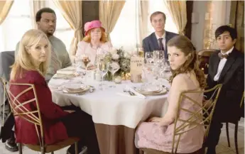  ??  ?? Lisa Kudrow ( from left), Craig Robinson, June Squibb, Stephen Merchant, Anna Kendrick and Tony Revolori play outcast guests consigned to the fringes of the wedding reception in “Table 19.”
| FOX SEARCHLIGH­T