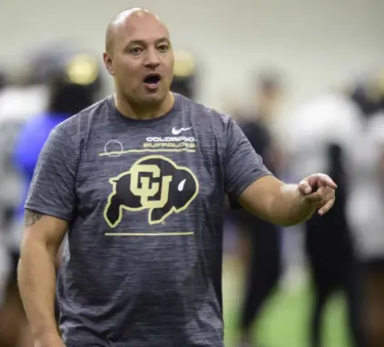  ?? Cliff Grassmick, Daily Camera ?? Receivers coach Phil Mcgeoghan is in his first season with the Buffs as part of a revamped staff. The Buffs were one of the worst offensive teams in the country last season.