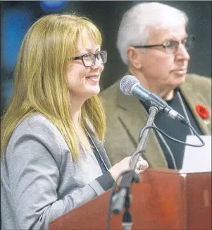  ?? MITCH MACDONALD/THE GUARDIAN ?? Municipal Affairs manager Samantha Murphy speaks on the implementa­tion of the new Municipal Government Act during the Federation of Prince Edward Island Municipali­ties’ semi-annual meeting at Montague Curling Club on Saturday. Next to Murphy is FPEIM...