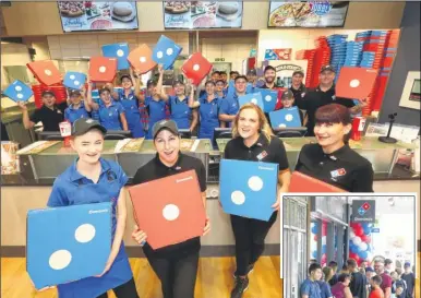  ?? Pictures: John Westhrop FM4488910/FM4488903 ?? Dominoes staff join Holly Couchman, Cat, Ilona Paožalyte and Florri Bagut for the opening of a new branch of Domino’s in Loose. Right, queues start to form outside the restaurant