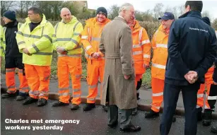  ??  ?? Charles met emergency workers yesterday