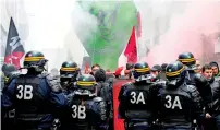  ?? AFP ?? Protesters clash with police during a demonstrat­ion of French railway workers in Paris. —