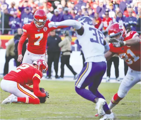  ?? DENNY MEDLEY/USA TODAY SPORTS ?? Kansas City Chiefs kicker Harrison Butker boots the winning field goal against the Minnesota Vikings at Arrowhead Stadium Sunday in Kansas City, Mo. The last-second, 44-yard field goal gave the Chiefs a 26-23 victory over the previously surging Vikings.