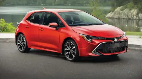  ?? TOYOTA PHOTOS ?? 2019 Toyota Corolla hatchback XSE (1): As it is around town, the Toyota Corolla hatchback’s ride consistent­ly balances sportiness and comfort.