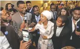  ??  ?? MINNEAPOLI­S: Ilhan Omar, candidate for State Representa­tive for District 60B, arrives for her victory party on election night on Tuesday. Omar, a refugee from Somalia, is the first Somali-American Muslim woman to hold public office. — AFP