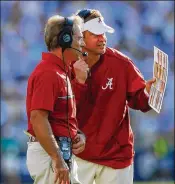  ?? KEVIN C. COX / GETTY IMAGES ?? Lane Kiffin (right, with Nick Saban in 2016) says his former boss recruits better than anyone else: “They have better players than everyone they play. “