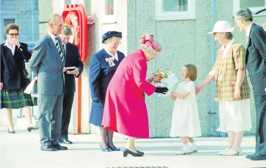  ??  ?? Prince Philip supporting the Queen at the start of their Balmoral holiday in 1996.