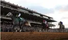  ?? Carr/Getty Images ?? Joel Rosario rides Knicks Go to win the Breeders’ Cup Classic. Photograph: Rob