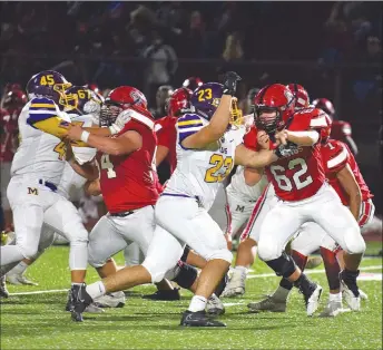  ?? RICK PECK/SPECIAL TO MCDONALD COUNTY PRESS ?? McDonald County linemen Kaidan Campbell (54) and Logan Harriman (62) pass protect during the Mustangs’ 47-0 loss to Monett on Oct. 18 at MCHS.