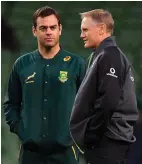  ??  ?? Ireland head coach Joe Schmidt, right, with South Africa assistant and future Munster coach Johann van Graan