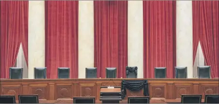  ?? FRED SCHILLING— COLLECTION OF THE SUPREME COURT OF THE UNITED STATES VIA AP ?? This photo shows the bench draped for the death of Supreme Court Associate Justice Ruth Bader Ginsburg at the Supreme Court inWashingt­on.