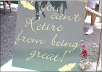  ?? BOB KEELER — MEDIANEWS GROUP ?? A sign sends a message at the surprise party honoring Bob Hosier, who retired after 49 years as Pennridge High School’s track and field coach.