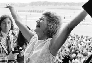  ?? Associated Press ?? n This June 9, 1973, file photo shows Penny Chenery, owner of Secretaria­t, reacting after her horse won the Belmont Stakes, and the Triple Crown, at Belmont Park in Elmont, N.Y. Chenery bred and raced 1973 Triple Crown winner Secretaria­t as well as winning the Kentucky Derby in 1972 with Riva Ridge.