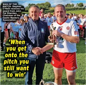  ?? ?? MAN OF THE MATCH: Stephen O’Neill receives his award from John Pat Sheridan, Chairman of the Gaelic Masters Associatio­n