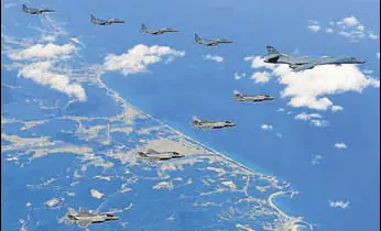  ?? AP ?? US Air Force bombers and stealth fighters and South Korean jets fly over the Korean Peninsula.