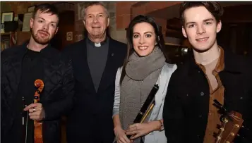  ??  ?? Fr. Martin McAnaney SM, European Provincial with teacher Emma Murphy and her brothers Niall and Cathal at the Civic Reception held to honour the visit of the Heads of the European Marist Educationa­l Centres to Dundalk.