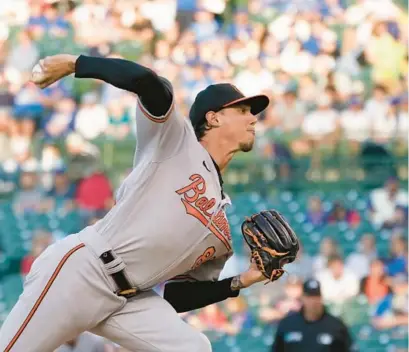  ?? CHARLES REX ARBOGAST/AP ?? In his past four starts, including the one run on four hits he allowed in Wednesday’s 7-1 win over the Cubs, Orioles starting pitcher Spenser Watkins has conceded three earned runs.