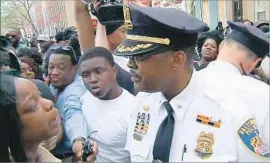  ??  ?? BALTIMORE police Lt. Col. Melvin Russell deals with the community fallout from the April 2015 death of Freddie Gray after being injured in police custody.