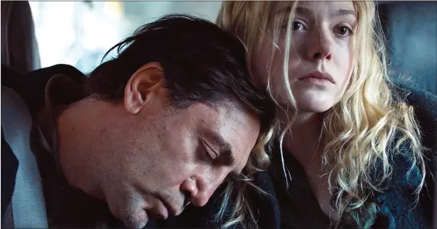  ??  ?? ARTY: Javier Bardem and Elle Fanning in emotional drama The Roads Not Taken